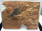 Pinax fittile raffigurante il ratto di Persefone, dal santuario di Persefone a Locri Epizefiri (non gli scavi di Monte Palazzi).