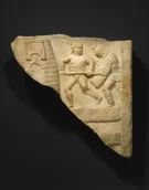 Esempio di rilievo marmoreo raffigurante un combattimento tra gladiatori (non le lastre del monumento funerario di Lucus Feroniae).