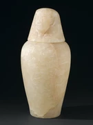 Esempio di vaso canopo egizio in alabastro, con coperchio a testa umana (non i reperti ritrovati a Saqqara).