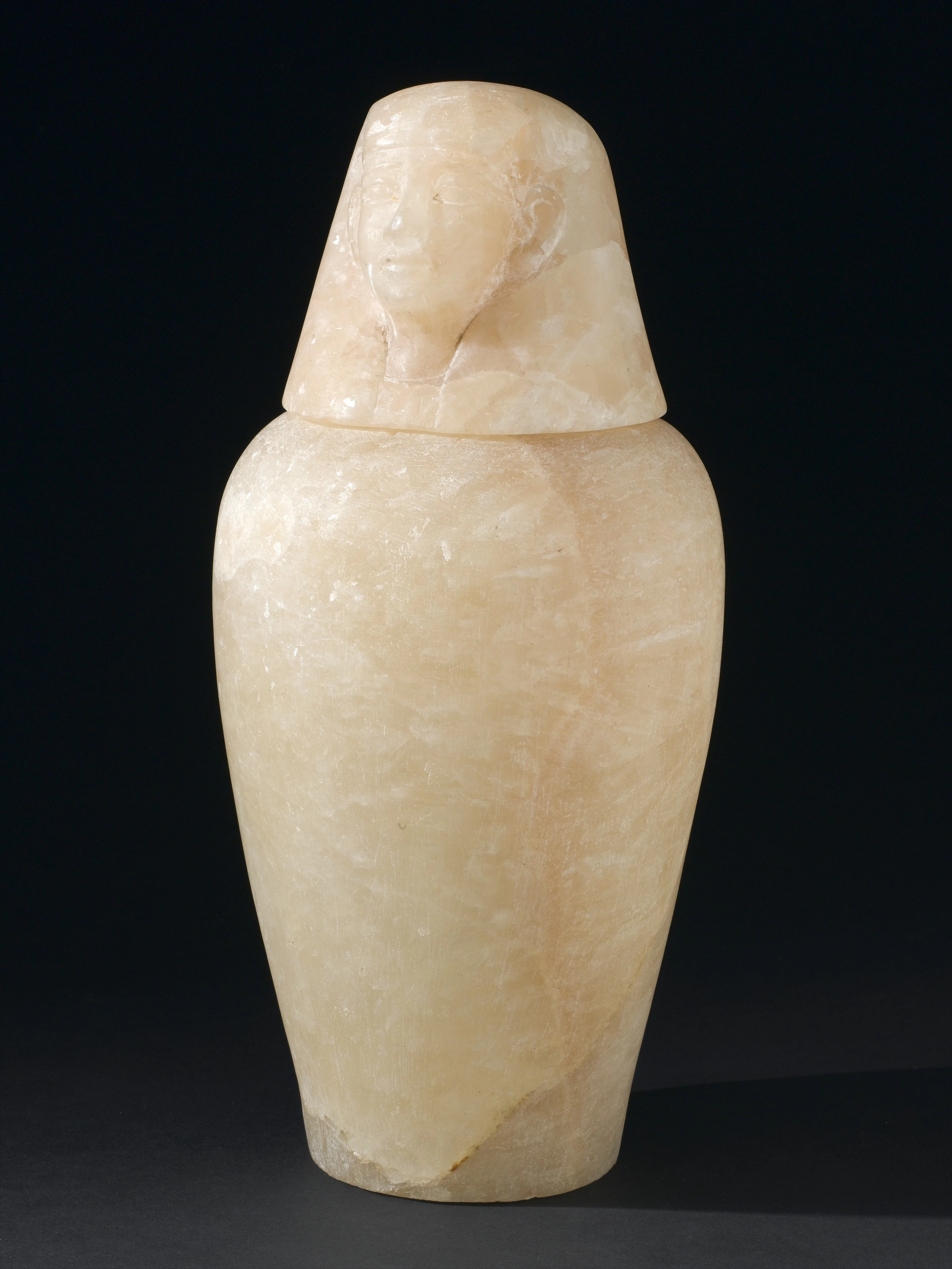 Esempio di vaso canopo egizio in alabastro, con coperchio a testa umana (non i reperti ritrovati a Saqqara).